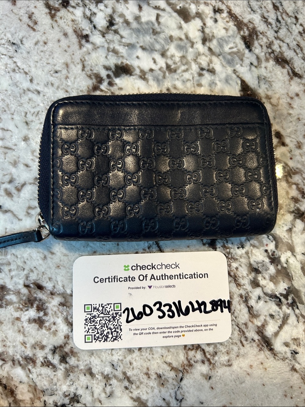 Gucci Black Embossed GG Zip Card Holder